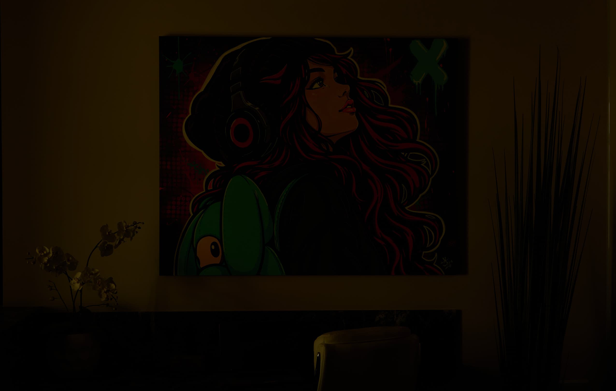 Colorful headphone portrait artwork in the Eagle Sentry showroom before beam framing