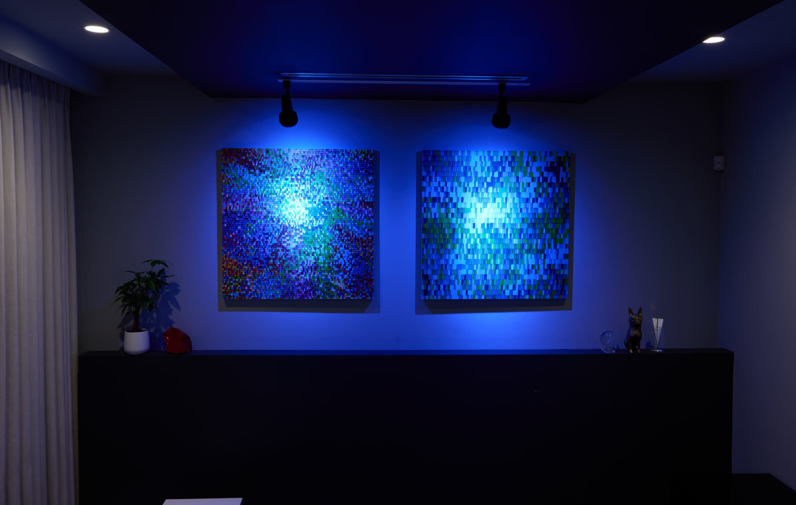 Blue scene Ketra lighting scene on two geometric artworks