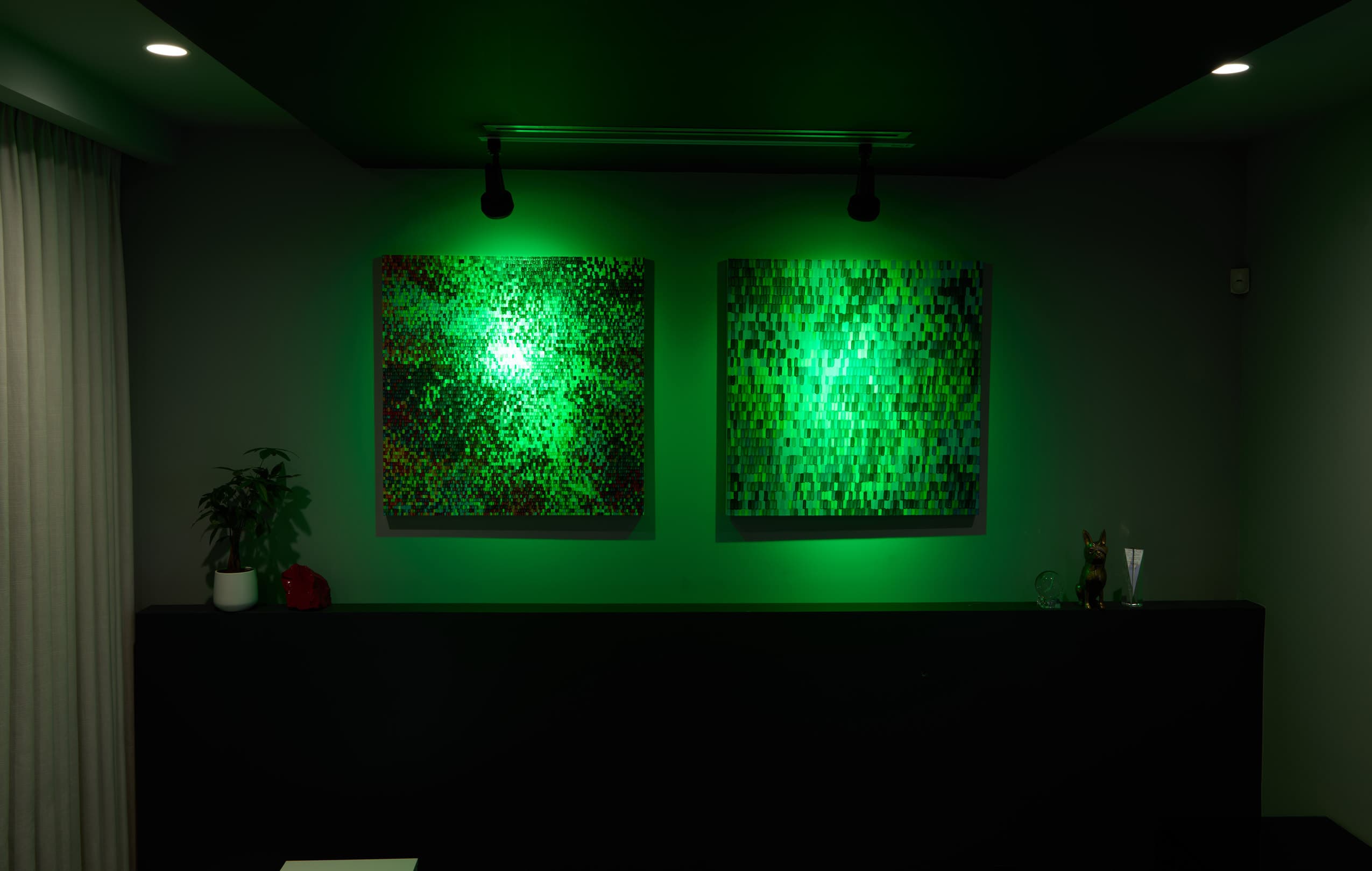 Green scene Ketra lighting scene on two geometric artworks