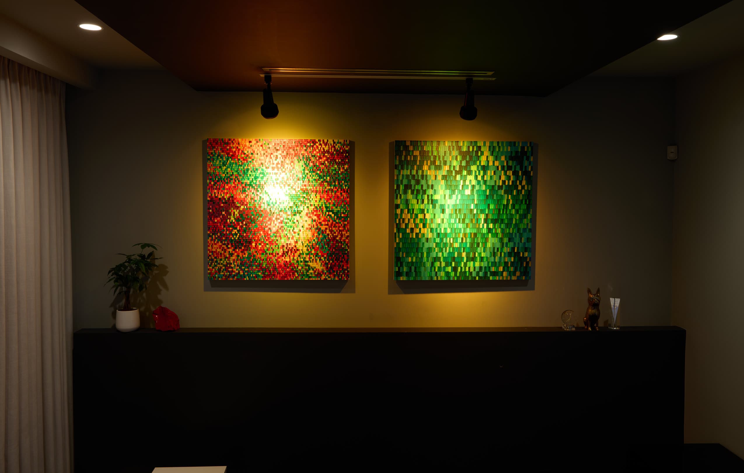 Warm scene Ketra lighting scene on two geometric artworks