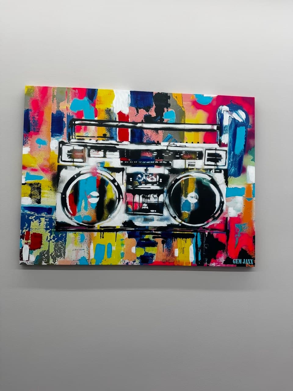 Close detail of a colorful artwork in the Eagle Sentry showroom