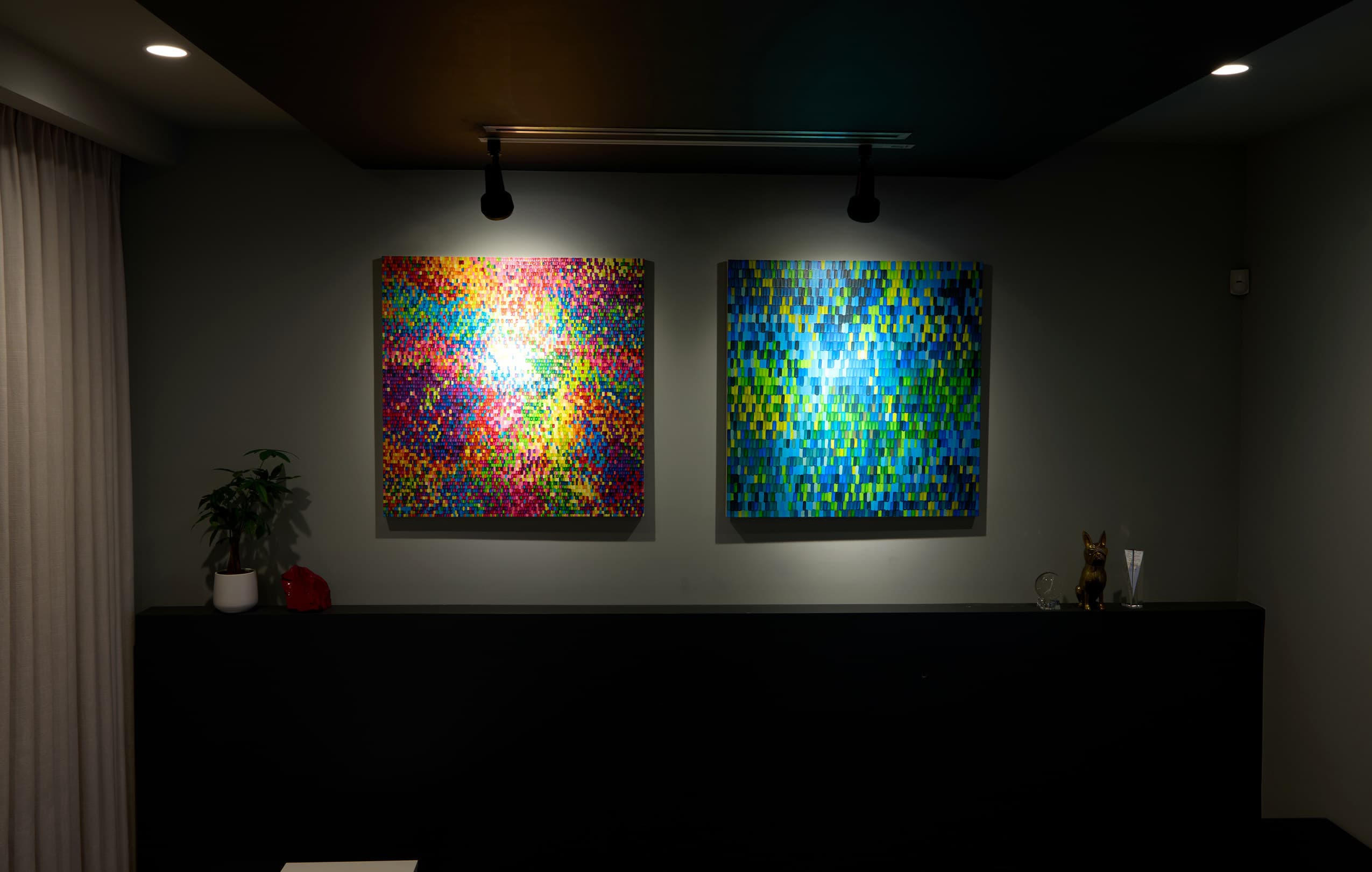 Interactive visualization of color vibrancy on two geometric artworks under Ketra lighting
