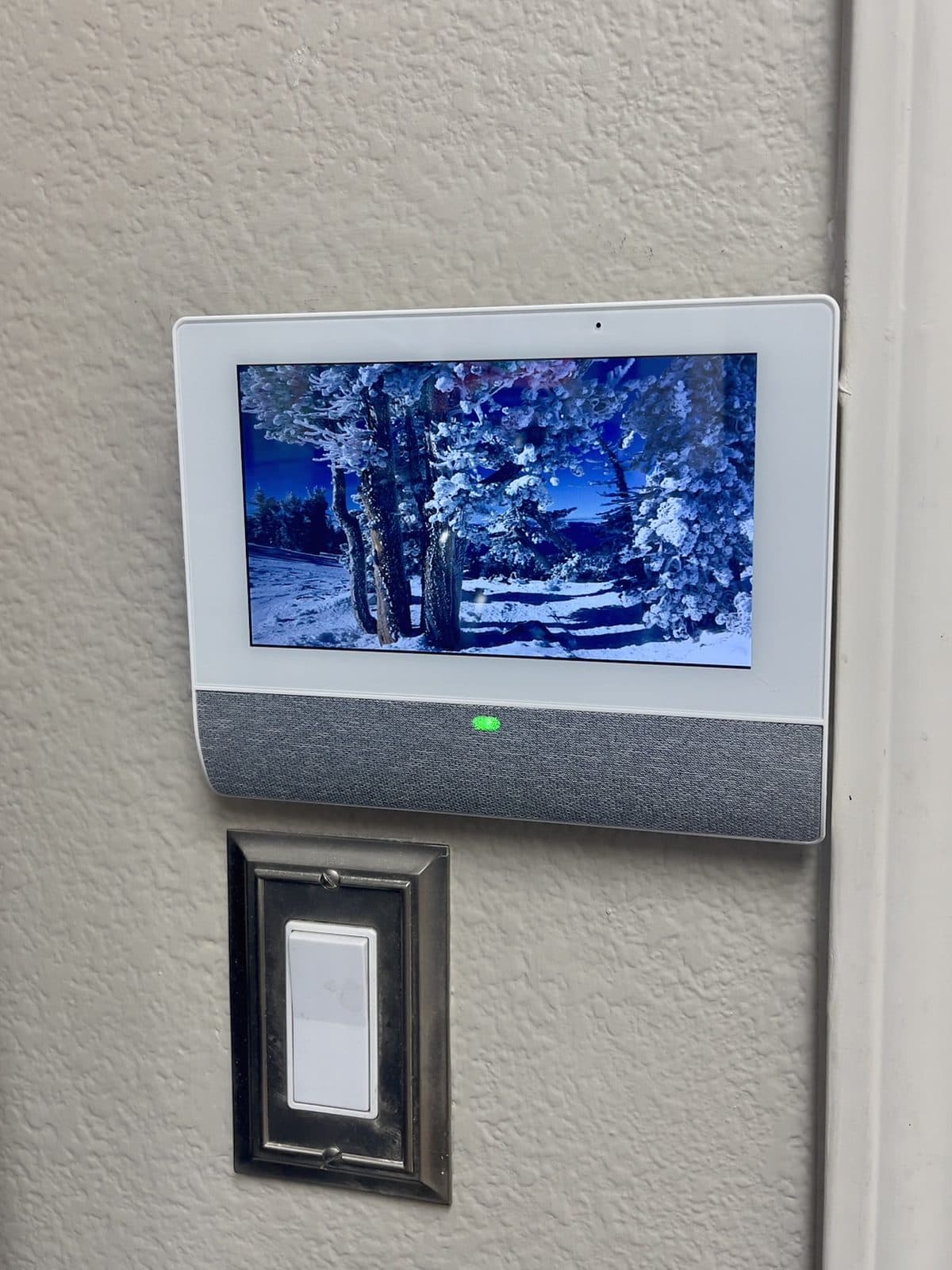 Second Qolsys IQ Remote 7-inch touch screen keypad mounted beside a doorway