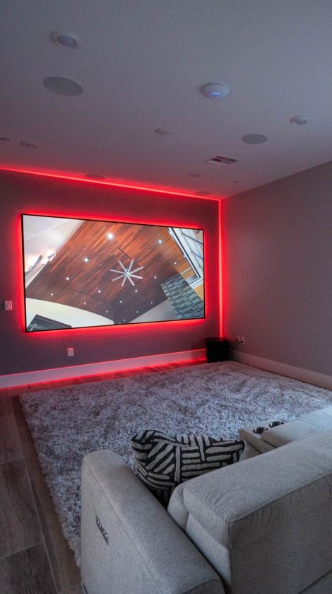 modern home with glass windows at dusk