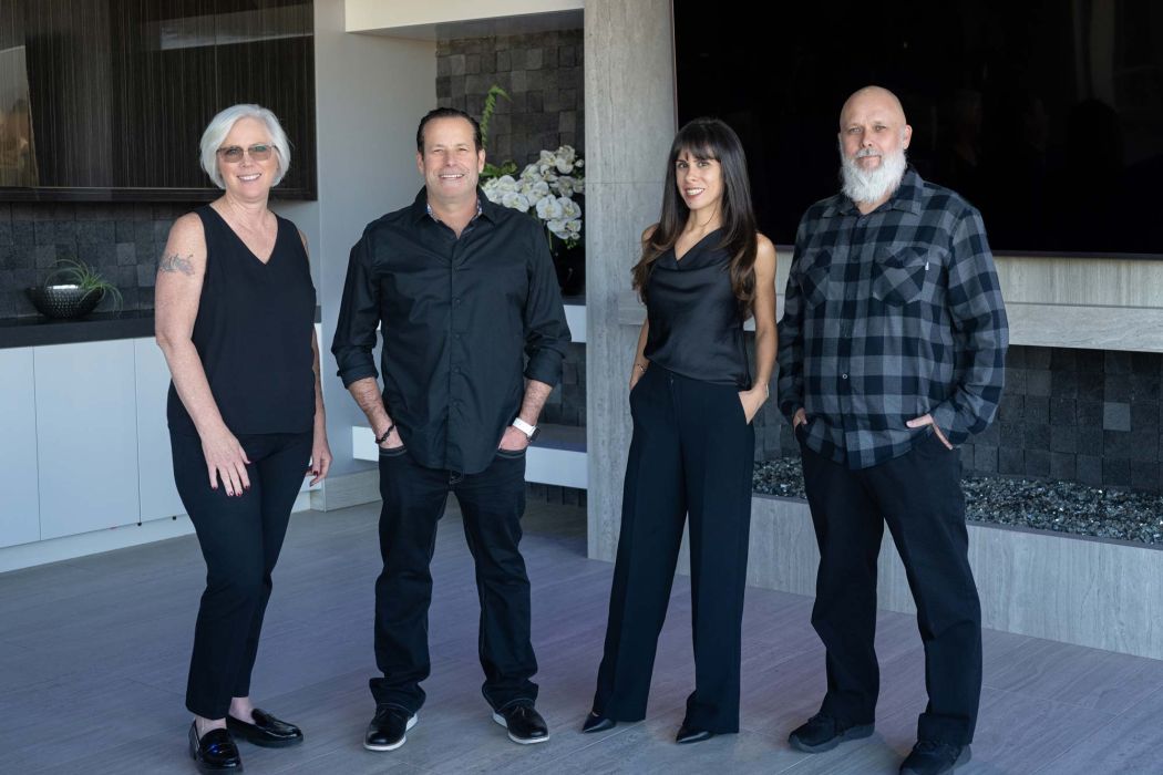 people sitting at a table discussing work